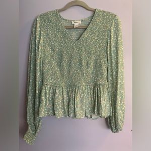 Springy style top on light jade green